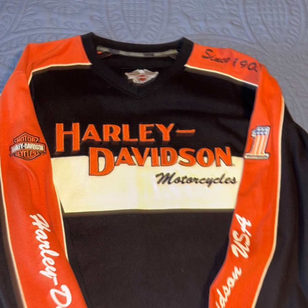 Harley-Davidson Black, orange , and cream/off white colored V-Neck Sweat Shirt